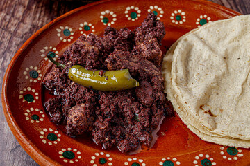 Dish full of moronga or blood sausage, with tortillas, a typical food from Mexico, Central America...