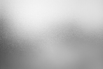 shiny grainy silver foil textured aluminum metallic abstract blurred gradient monochrome plain background