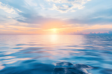 Obraz premium Golden sunset paints the ocean and sky with vibrant hues, creating a breathtaking seascape