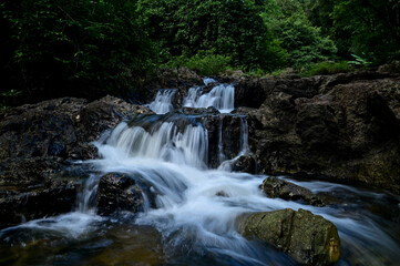 A small waterfall created from water flowing from Khlong Lan Waterfall. In Namtok Khlong Lan National Park Kamphaeng Phet Province