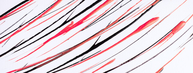 Thin red and black lines and splashes drawn on white background. Abstract art backdrop with rose brush stroke.