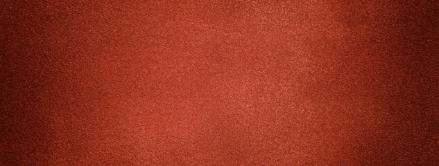Dark brown and brick background from felt textile material with vignette. Structure of ginger suede velvet fabric