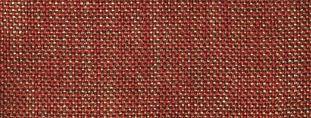 Texture dark brown background from woven textile material with wicker pattern, macro. Vintage ginger fabric