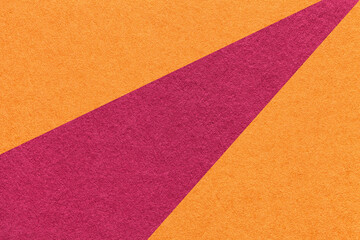 Texture old craft orange and purple paper background, macro. Structure of vintage abstract wine cardboard
