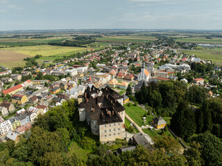 Obraz premium Aerial drone view of Castle Jansky Vrch in Javornik. The Jansky Vrch State Chateau on a rocky hill above the town of Javornik, located in the Czech Republic in Moravia. Javornik in summer drone fly...