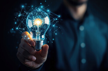 Businessman holding lightbulb concept of innovation and creativity idea