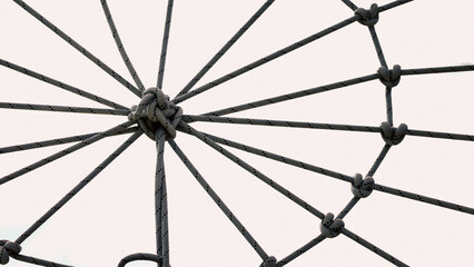 many ropes and one big knot close up