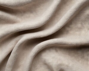 Close-up of luxurious beige fabric with soft, smooth texture, ideal for backgrounds or design projects.