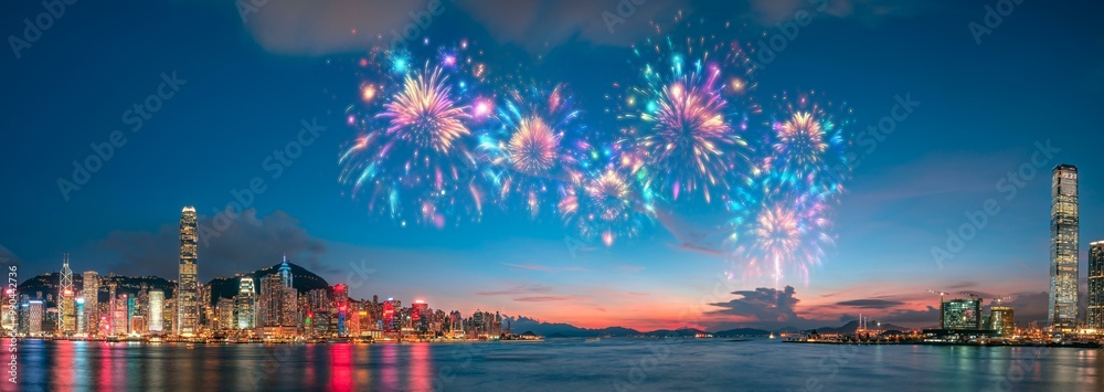 Poster a vibrant cityscape with skyscrapers illuminated at night, showcasing a spectacular fireworks displa