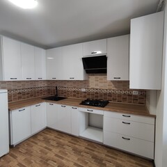  Custom white kitchen made of chipboard and MDF
