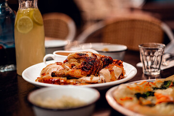roast chicken display on table restaurant. Selective focus, shallow depth of field.