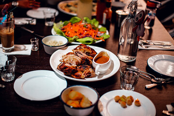 roast chicken display on table restaurant. Selective focus, shallow depth of field.