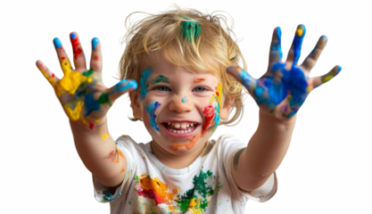 A young child is holding up his hands and smiling