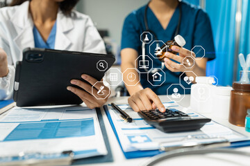 Doctor working in hospital use calculator, Healthcare and medical concept.