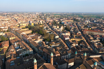 Obraz premium Cremona panorama of the cities seen from the Torrazzo tower at sunset. High quality photo