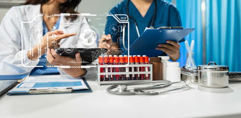 Chemist scientist holding test tube and tablet conducting experiment in laboratory with equipment, science concept.