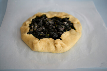 the process of making galette pie with mulberry