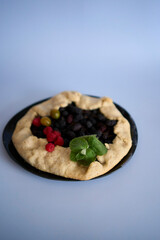 the process of making galette pie with mulberry