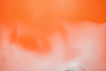 The orange background with white smoke or mist gives the impression of the spooky atmosphere of the scene. Halloween background concept