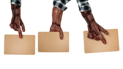 Set of monster hands holding a piece of brown paper. A blank piece of brown paper for copy space....