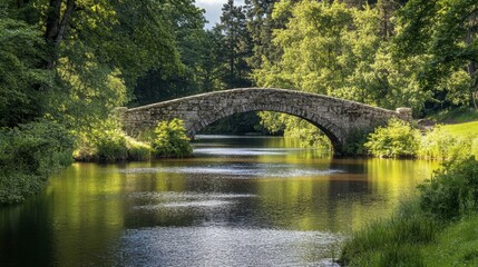 A view of an old stone bridge crossing a serene river, with surrounding trees and greenery reflecting in the water.