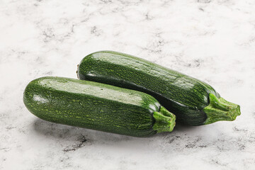 Raw green ripe zucchini vegetable