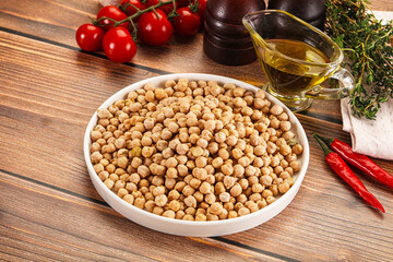 Dry chickpea seeds heap in the bowl