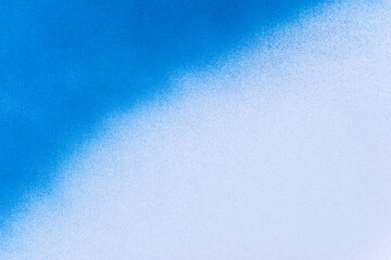 スプレー塗料で塗られた青色の背景