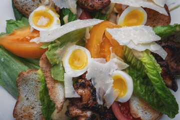 Caesar salad close-up on a plate