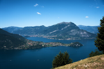 Fototapeta premium Lake Como with charming yachts surrounded by hills