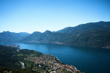 Lake Como with charming yachts surrounded by hills