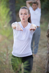 portrait of couple exercising outdoors