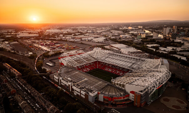 Aerial drone view of Manchester United Football Club Old Trafford Stadium. MANCHESTER, UK - SEPTEMBER 22, 2024