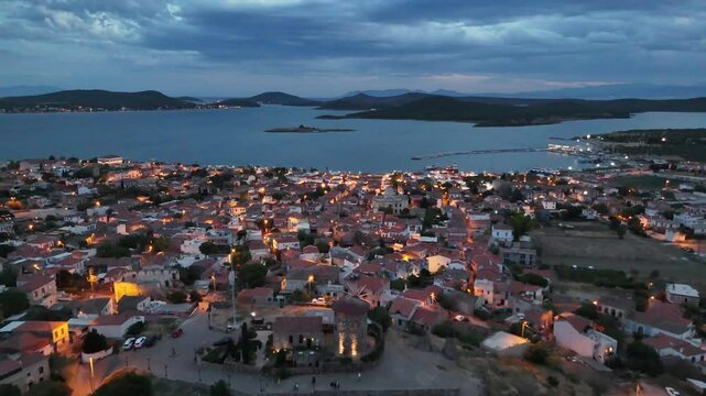 Sunset and city lights on Cunda Island in Turkey
