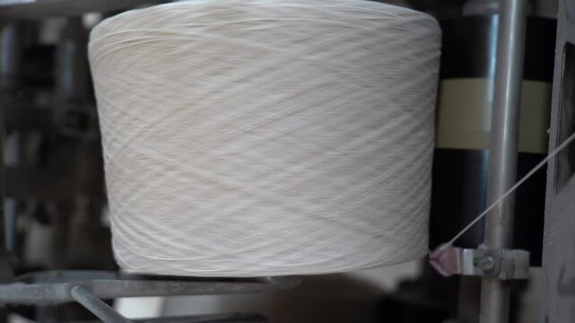 thread winding machine in spinning mill