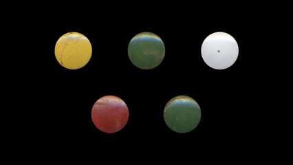 a set of colorful aged circles, rusty stationery tacks, front view, isolated metal push rounded pins on black background