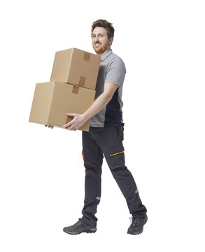 Delivery man carrying cardboard boxes