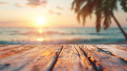 The warm glow of sunset casts vibrant colors over a wooden table, creating a perfect setting by the ocean for relaxation and reflection