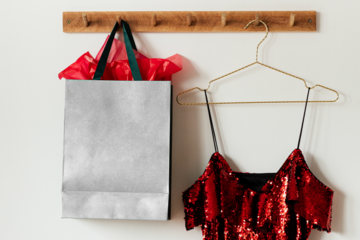 Green feminine bag mockup on a wall hanger