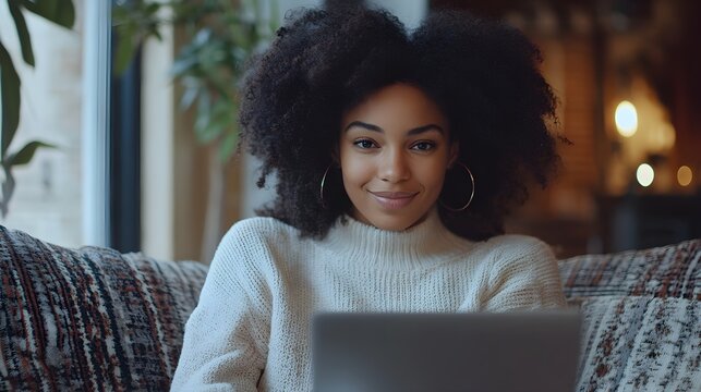 African American woman enjoying remote work, virtual meeting with global colleagues, flexible and inclusive work culture, modern tech setup, casual workday