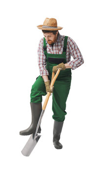 Smiling gardener posing with a shovel