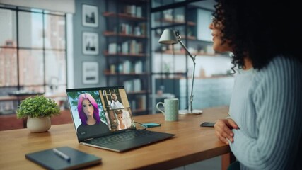 Woman in Home Office Participates in Video Call With Colleagues and Friends using 3D animated Avatars. Laptop Displays Diverse Virtual Meeting. ModernCommunication via Social Media - Powered by Adobe