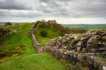 Roman Wall over the hills at Walltown, Hadrian's Wall is a World Heritage Site in the beautiful Northumberland National Park. Popular with walkers along the Hadrian's Wall Path and Pennine Way