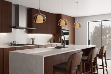 The modern kitchen has an elegant design combined with stylish and modern lighting