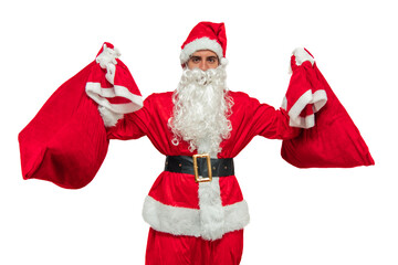 Santa Claus holding two sacks of gifts high while looking at the camera white background