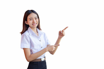 Asian beautiful young woman student wearing Thai university student uniform is smiling and looking at camera standing to present something confidently while isolated white background.