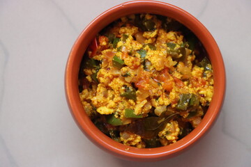 Paneer Bhurji or paneer burji, cottage cheesse fry with onion, tomato, capsicum and spices