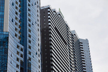 Obraz premium Modern office building. Architectural detail of modern building. Business concept of successful industrial architecture.