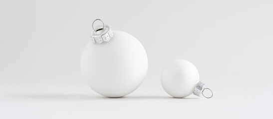White Christmas balls on white background. Monochromatic holiday mockup.	
