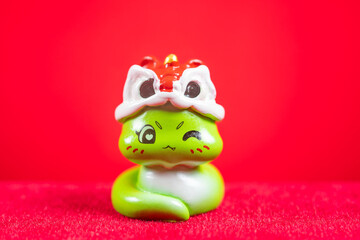 Chinese New Year of Snake mascot on red no logo no trademark